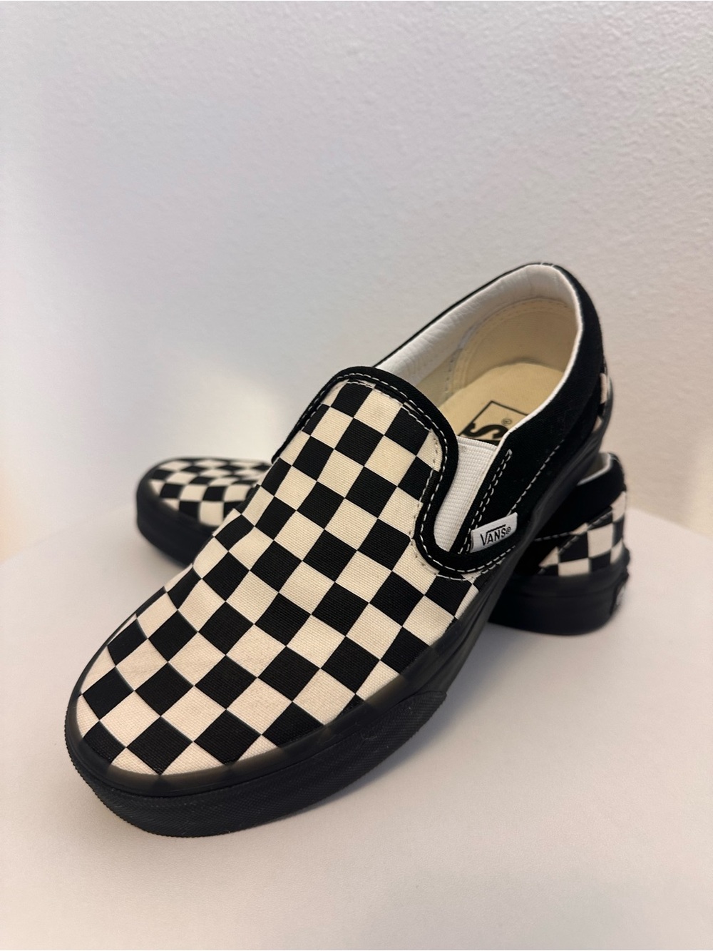 Vans Women’s Checkerboard Slip-On - Black and White with Black Soles